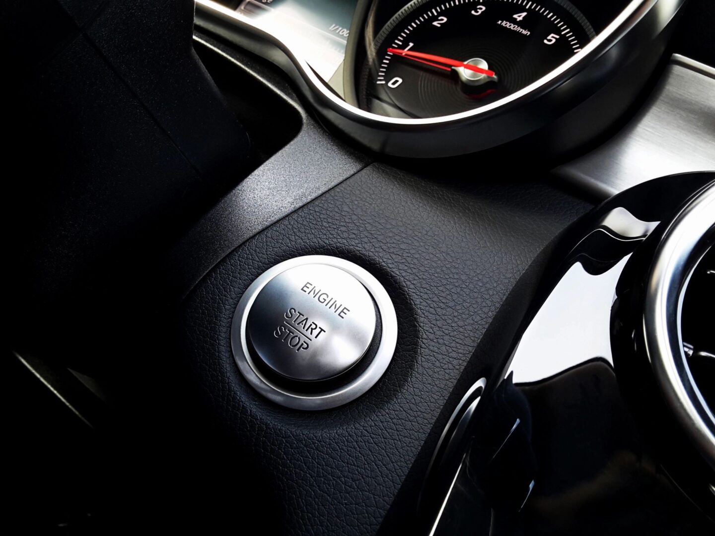 A close up of the dashboard and steering wheel.